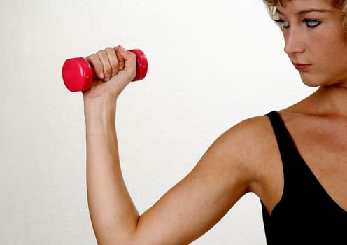 Girl with dumbbells