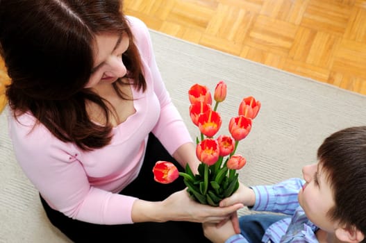 Mother and son with flowers