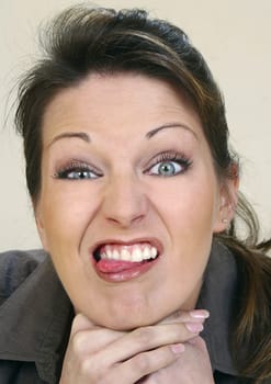 Girl sticks her tongue out
