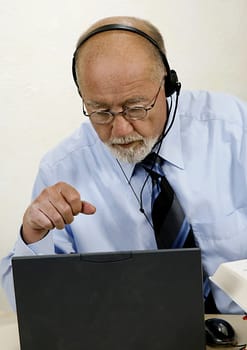 Senior with headset