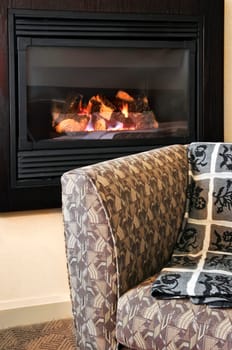 Fireplace and armchair