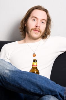 man with bottle of beer