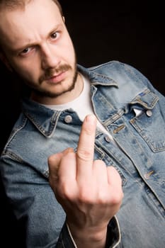 young man giving the middle finger