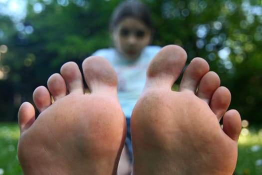 Girl and soles of the feet