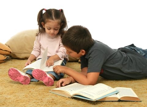 Brother and sister reading books