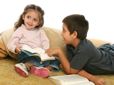 Brother and sister reading books