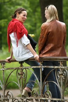 Girlfriends chatting in the park
