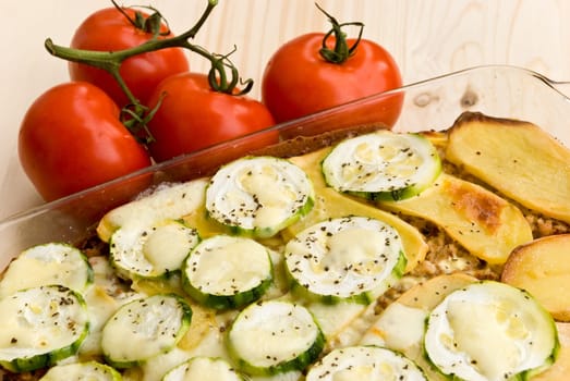 Zucchini and potato casserole with minced meat