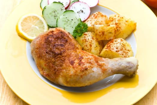 Chicken leg,fried with fried potatoes