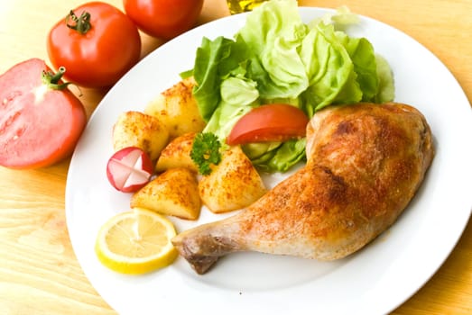 Chicken leg,fried with fried potatoes
