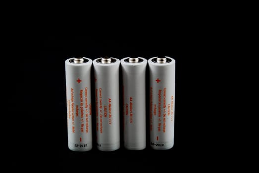 batteries on black background