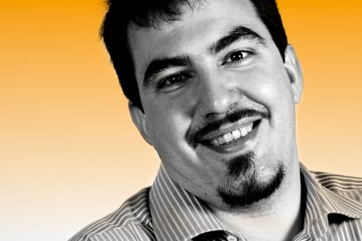 portrait of young confident businessman smiling