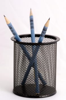Wooden pens on pen holder