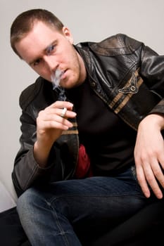 man smoking a cigarette