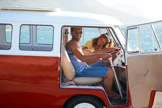 Caravan, transportation and couple on road trip, travel and vacation with portrait of people in relationship. Happiness, freedom and together on adventure with transport, anniversary date and smile.