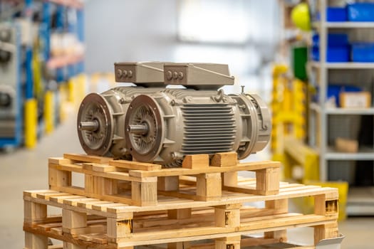 new modern electric motors ready for export in the factory on pallets.