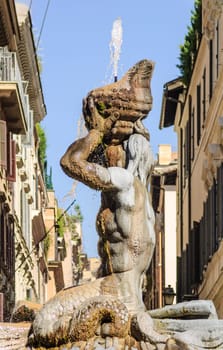 Side view of the Triton fountain in Barberini square, Rome, Quirinal