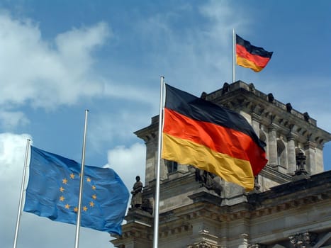 Reichstag in Berlin with German flags