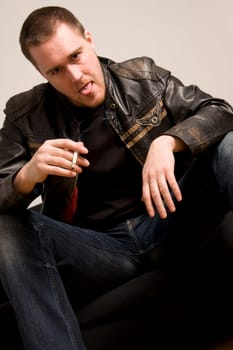 man smoking a cigarette