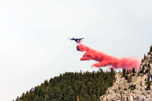 firefighting aircraft dumping retardant