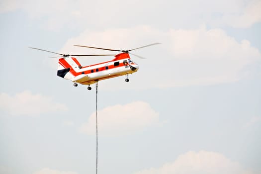 helicopter lifting cargo