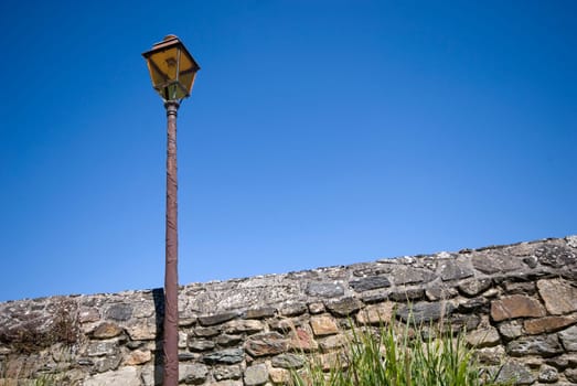 Lantern in front of blue sky