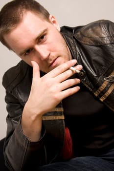 man smoking a cigarette