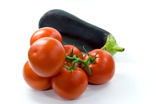 Vine tomatoes and aubergines -on white
