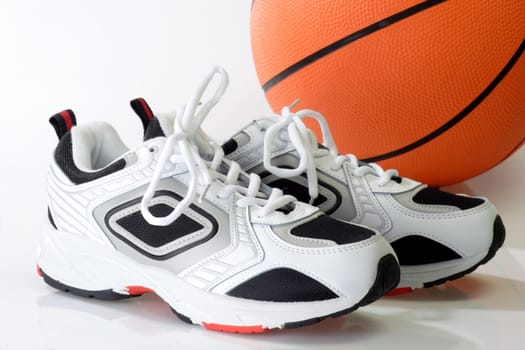 Sports shoes with basketball