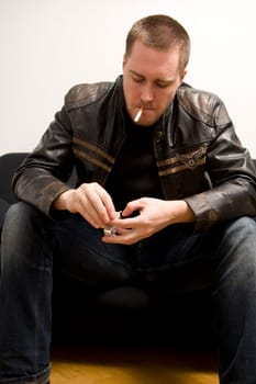 man smoking a cigarette