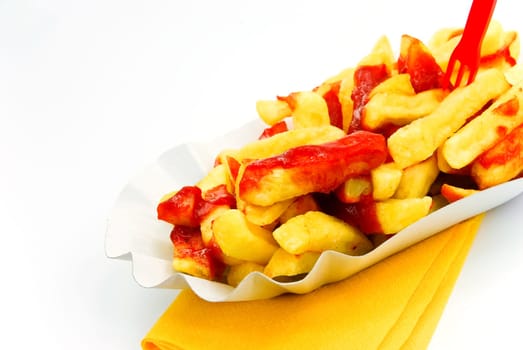 French fries with ketchup - on white