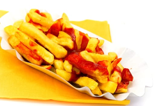 French fries with ketchup - on white