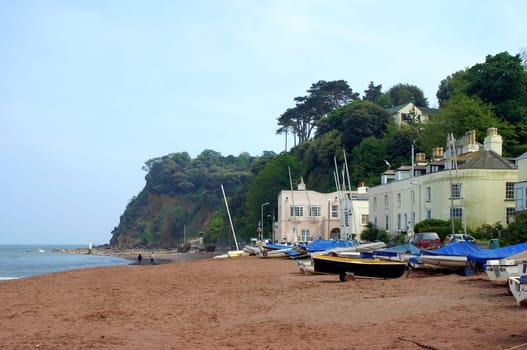 On the red sandy beach of Shaldon on the River Teign opposite Teignmouth on the south coast of Devon,south-west England
