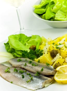 Matjes fillet,salad,wine