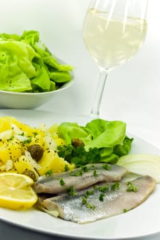 Matjes fillet,salad,wine
