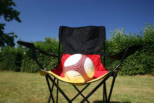 Soccer ball on chair with German flag