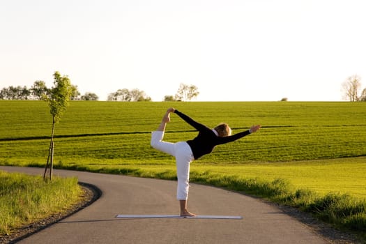 Woman doing yoga exercises