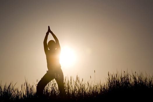 Woman doing yoga exercises