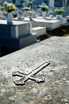 Cross engraved in a tombstone