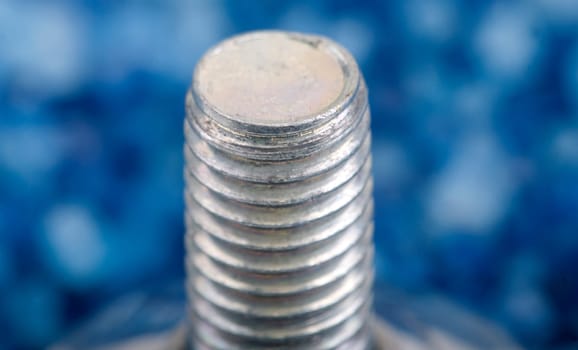 Metal thread in front of blue