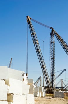 Cranes and blocks at a marble quarry