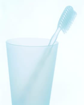 Toothbrush in cup