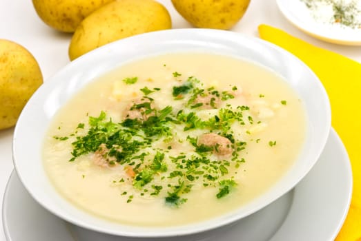 Potato cream soup with meatballs