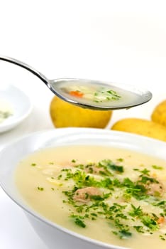 Potato cream soup with meatballs