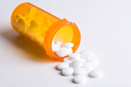 headache tablets on white