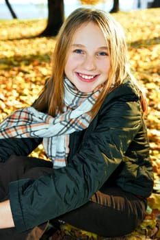 Teenage girl in the fall