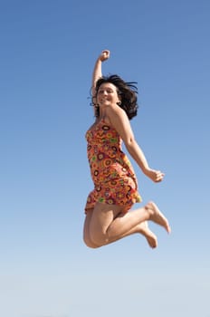 Beautiful girl jumping