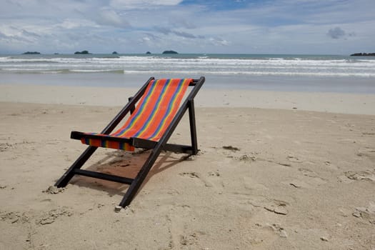Sun lounger on the sandy beach