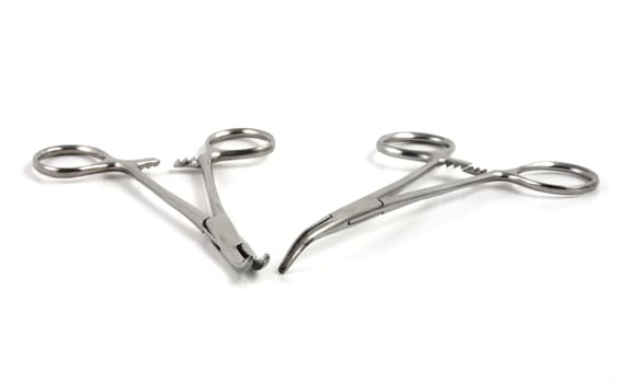 Hemostats and clamps