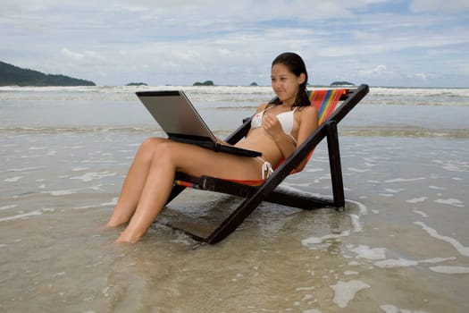 Teenager,vacation with laptop